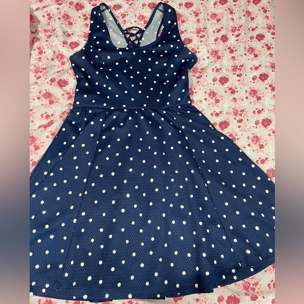 Short, light dress, navy blue. Beautiful crossed top-back part.